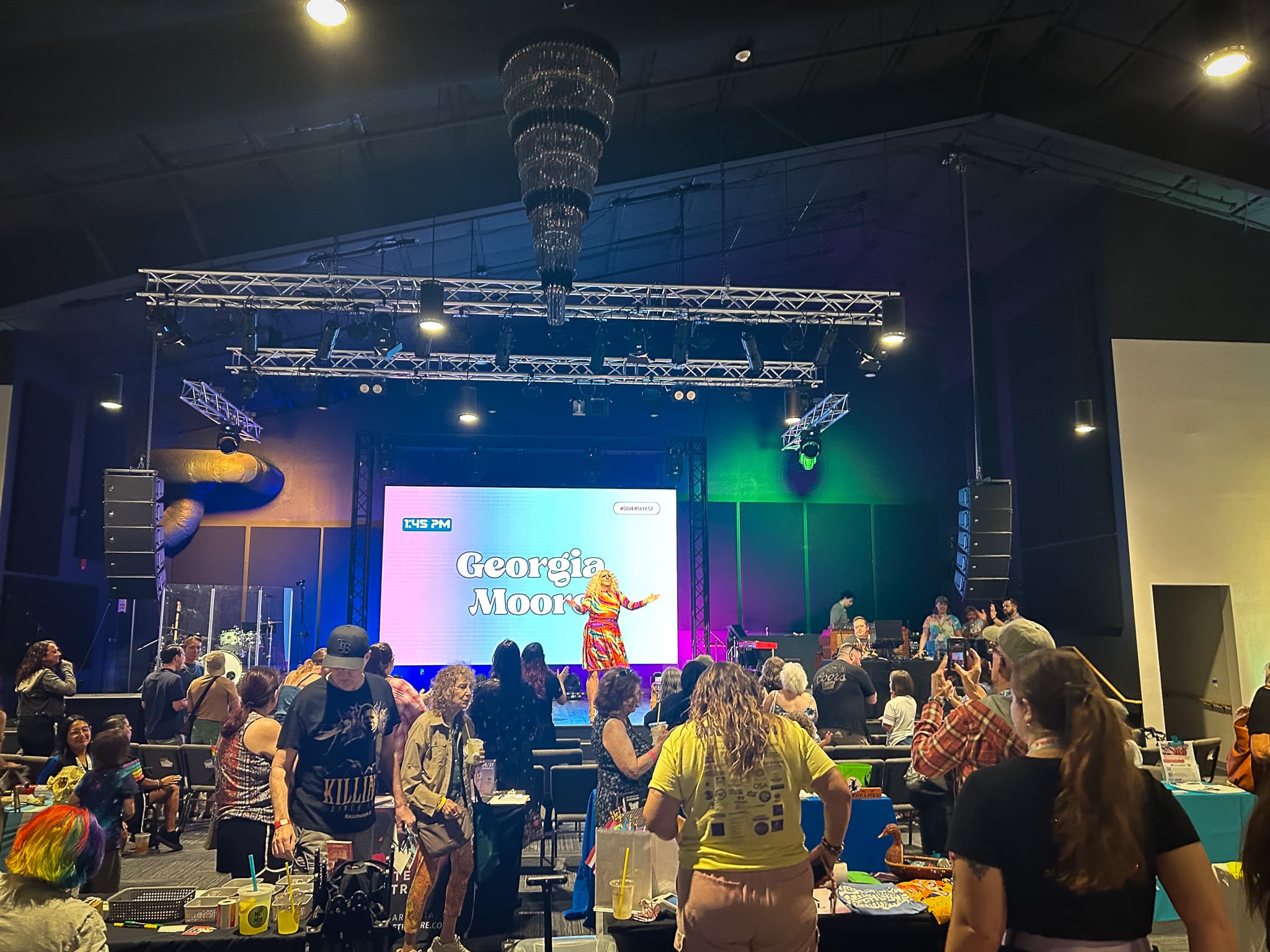 Drag queen performs before crowd