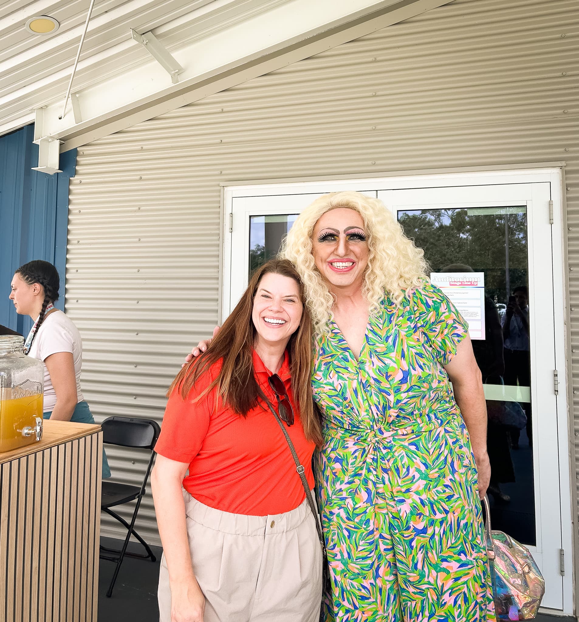 Executive Director Annie Berkness poses with drag queen
