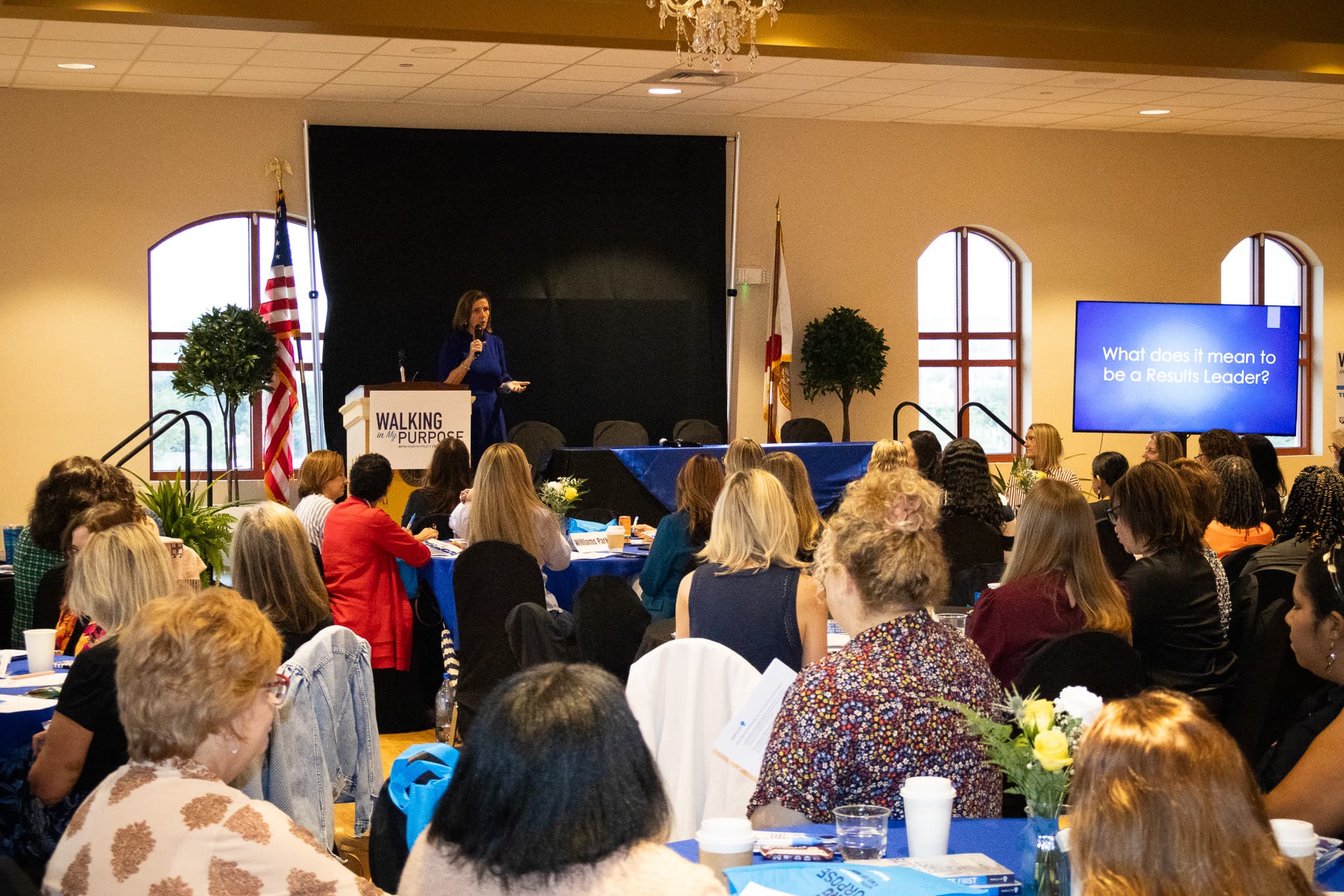Robyn Faucy presents to audience